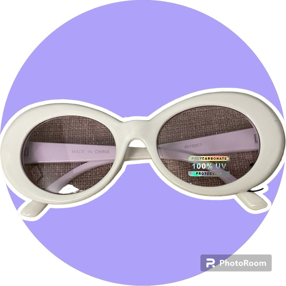 NWT. Women’s SA106 Sunglasses.Blocks 100% UBA/UVB Rays.White w/Purple Tint Lens.